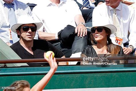 Singer Patrick Bruel and Caroline Nielsen attend the 2015 Roland .